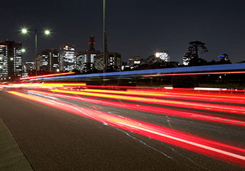 fast moving car headlights